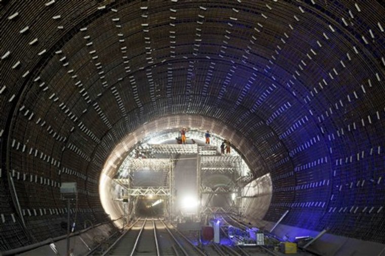 Workers place reinforcing bars inside the Gotthard Base Tunnel near Faido, Switzerland, on Aug. 27.